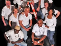 (Clockwise from top) Theresa Dolan, Robert Hargraves, Ray Mamrack, Kara Shelton, Roderick Slocum, Frantz Excellent, Mike Hagan, Denise Brunker, Andy Kushner, Damian Wallace: The Cast of THE EXONERATED at The Ritz Theatre Co. (Photo by Mark D. Thellmann)
