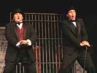 Producers Max (David T. Wills of Brookhaven) and Leo (Brendan Sheehan of Media) celebrate their big, happy ending in The Producers, at The Players Club of Swarthmore, running through November 6.