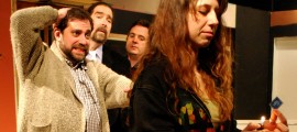 Emily West threatens to burn a priceless collector’s stamp before horrified onlookers Aaron Wexler, John Shanken-Kaye and Brian Jason Kelly in Langhorne Players' MAURITIUS, playing through May 7.