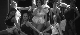 Jennie Knackstedt as Sally Bowles and the Kit Kat boys and girls in a scene from Stage Left Productions' CABARET, running at The Eagle Theatre through August 27.