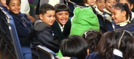 Children's faces light up when actor Jim Hettler as HYRONOMOUS A. FROG brings theatre to life before their eyes in Camden NJ.