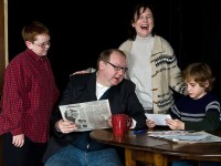 l-r; Ben Williams as Raphie, Steve Reazor as Old Man, Andrea Frassoni as Mother, Xander Dake as Randy in a scene from A CHRISTMAS STORY running at Tri-PAC in Pottstown PA through December 18. (Photo credit: John Daggett)