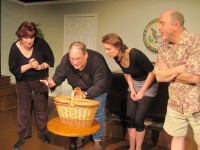 Bev Smith, Bob Goretski, Abbie Cichowski and Randy Knox in a scene from Forge Theatre's production of DON'T DRINK THE WATER, running in Phoenixville PA through January 28.