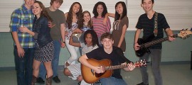 Tanner Mead, Victoria Scialfa, Ryan Strack, Mani Kissling, Kaitlynn Ely, Grace Manno, Madelyn Curtin and Zachary Manno; kneeling, J. Scott, left, and Noah Barson in CAMP ROCK opening at Kelsey Theatre on February 10.