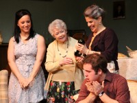 Caitlin (Michelle Paschetta of Folsom) brings a bottle of wine for dinner, impressing Emma (Ann Wood of Media) and Aida (Susan Triggiani of Springfield) while Nick (Matthew Prince of Media) realizes he's been set up, in OVER THE RIVER AND THROUGH THE WOODS, at The Players Club of Swarthmore, running through March 31.