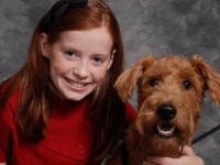 Julia Fumo stars as Annie (with Derry Sheridan as Sandy) in Off Broad Street Players' ANNIE, running at the Levoy Theatre through November 18.