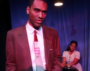 Vivian Baptiste (Liz Priestley), a local School teacher visits Jefferson (Richard Bradford) in Prison to lift his spirits in A LESSON BEFORE DYING. (Photo credit: John Doyle)