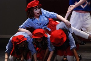 On Floor L to R - Mikaela Simon, Alexis Milne, Raven Stewart. On top Katie Fransko as Lola in OBSP's DAMN YANKEES. (Photo credit: Paul Simon.)