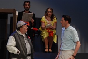 Foreground L to R - John Muller as Benny Van Buren, A.J. Mendini as Joe Hardy. Background L to R - Doug Eppler as Mr. Applegate, Kelsey Hogan as Gloria Thorpe. (Photo credit: Paul Simon)