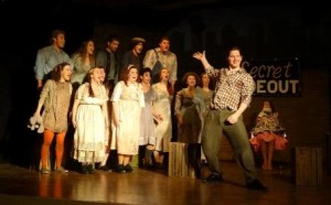 Alicia Crosby, Jessica Starczewski Potts, Elizabeth Krumpholz Wheeler, Justin Damm and Aimee Kerr in a scene from Narberth Community Theatre's URINETOWN.