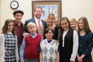 The unique Gilbreth Family: Lillian (Julia Philon), Chad McCutcheon (Frank, Jr.), Andrew Fellows (Fred), Scott Young (Dad), Christopher Sax (Dan), Martha Stringer (Mom), Hannah Sobolovitch (Anne), Ryan Young (Bill), Claire Norden (Ernestine) and not pictured Grace Garron (Martha) and Katie Pearcy (Jackie) star in Newtown Arts Company's production of  CHEAPER BY THE DOZEN.
