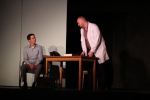 Geoff Bruen and Thomas-Robert Irvin try to piece things together, in Patrick's Marber's CLOSER. 