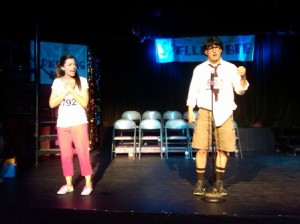 Lauren Cooper (Olive) and Steve Toth (Barfee) in a scene from THE 25TH ANNUAL PUTNAM COUNTY SPELLING BEE running at Barnstormers Theater through May 25.