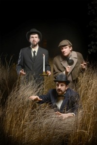 The cast of Curio Theatre Company's THE HOUND OF THE BASKERVILLES: back row from left to right, Harry Slack and Steve Carpenter. Down front, CJ Keller. (Photo credit: Kyle Cassidy)